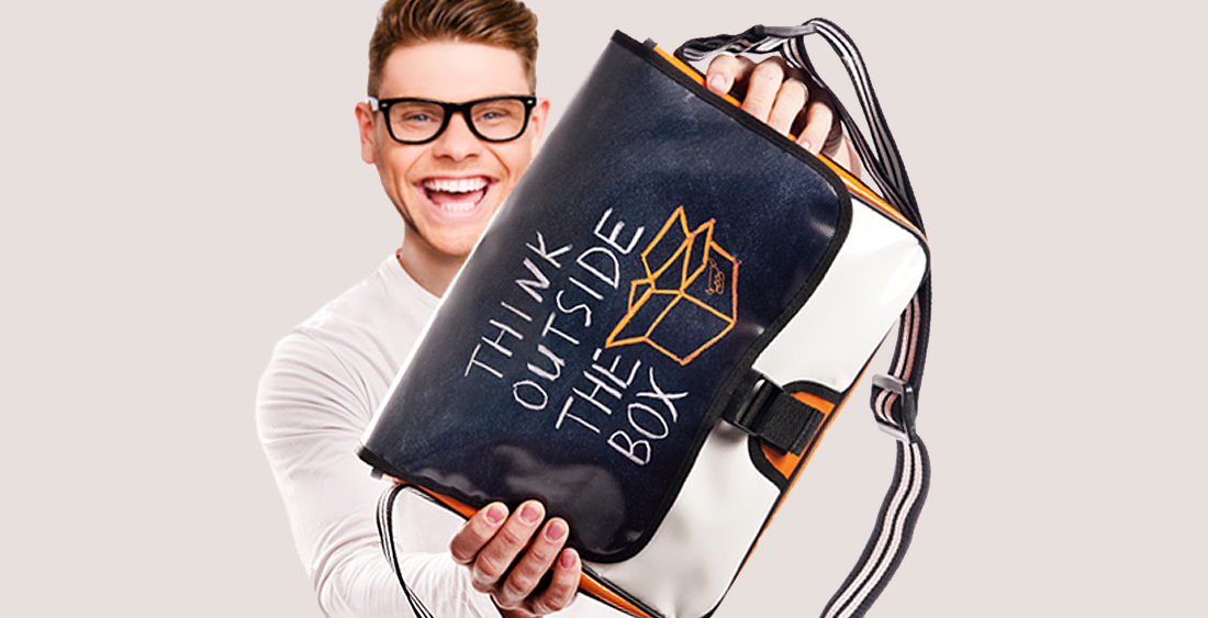 Modular bags as promotional bags held up by a person