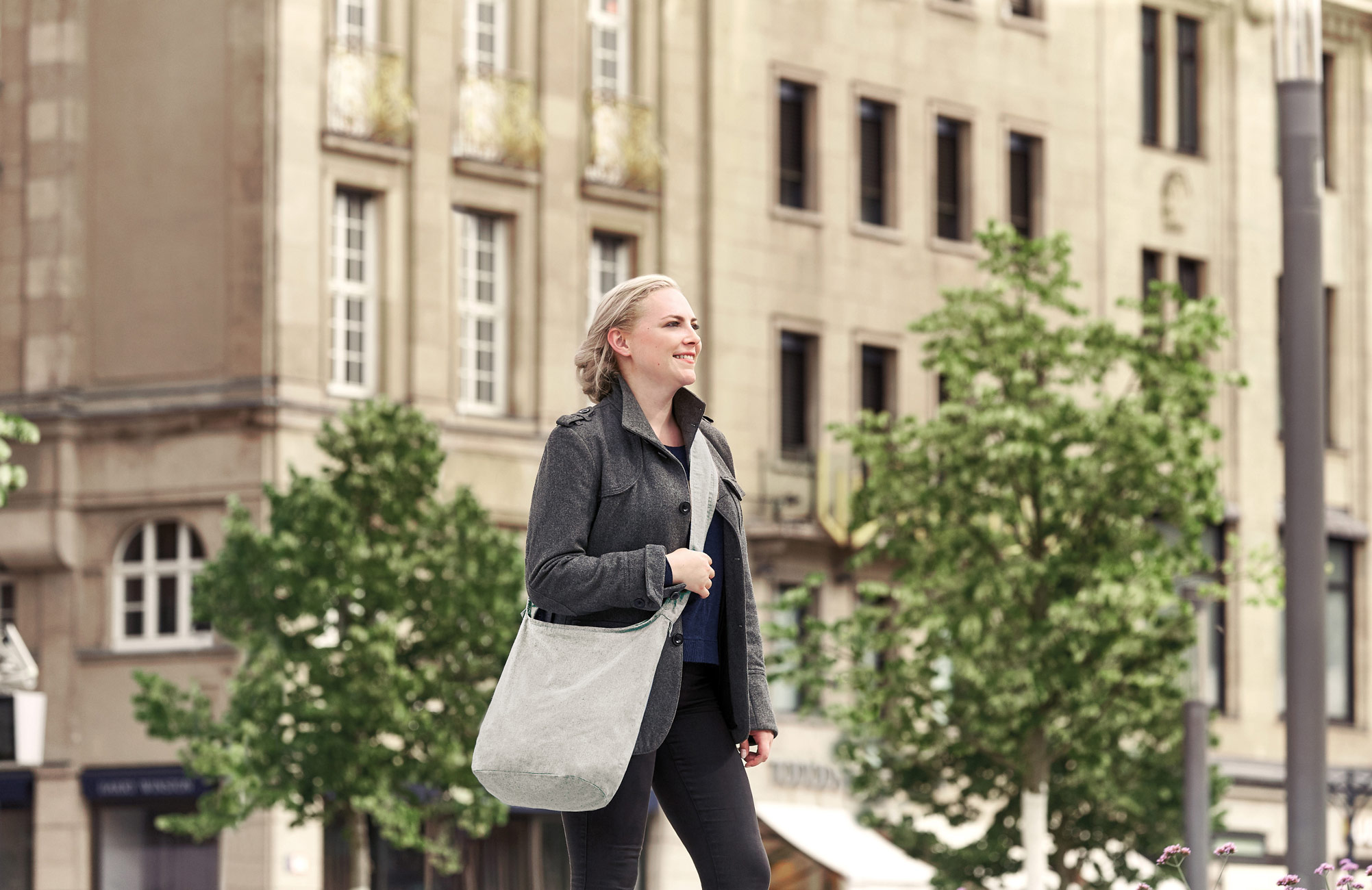 shoulder bag PLANET worn outside in daily life