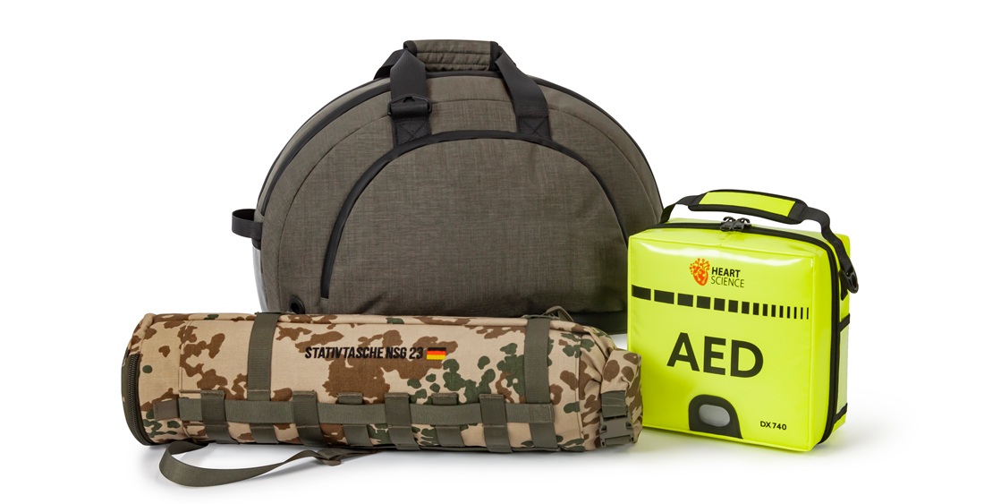 Group picture of three different technical bags, e.g. equipment bags or emergency bags.